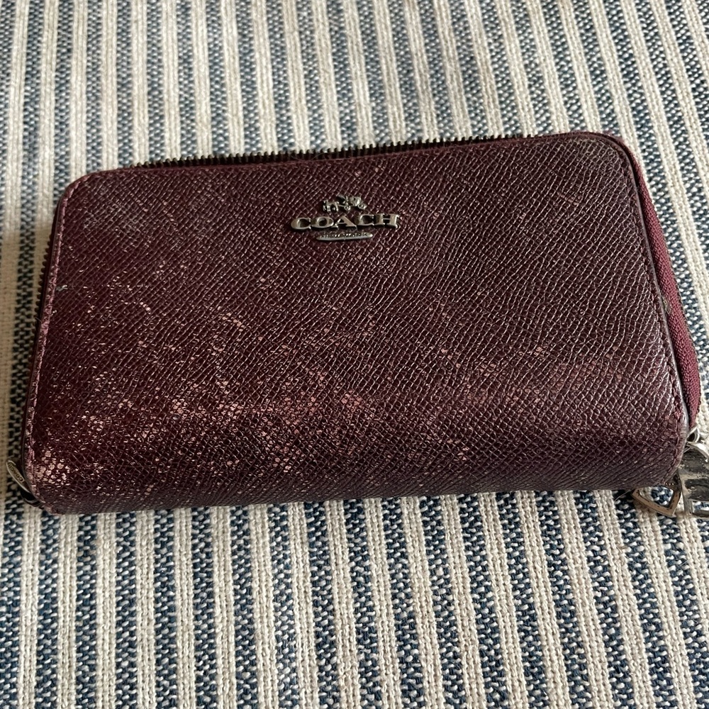 Coach wallet, well loved. Everything still works!